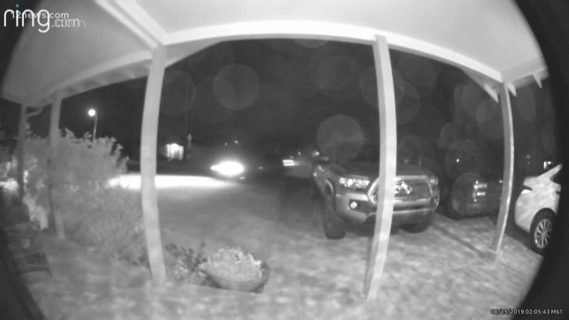 Video from a Ring doorbell shows a car speeding across the front lawn of a Phoenix home near 21st Avenue and Camelback Road, only coming to a stop when the driver slammed into a brick wall.