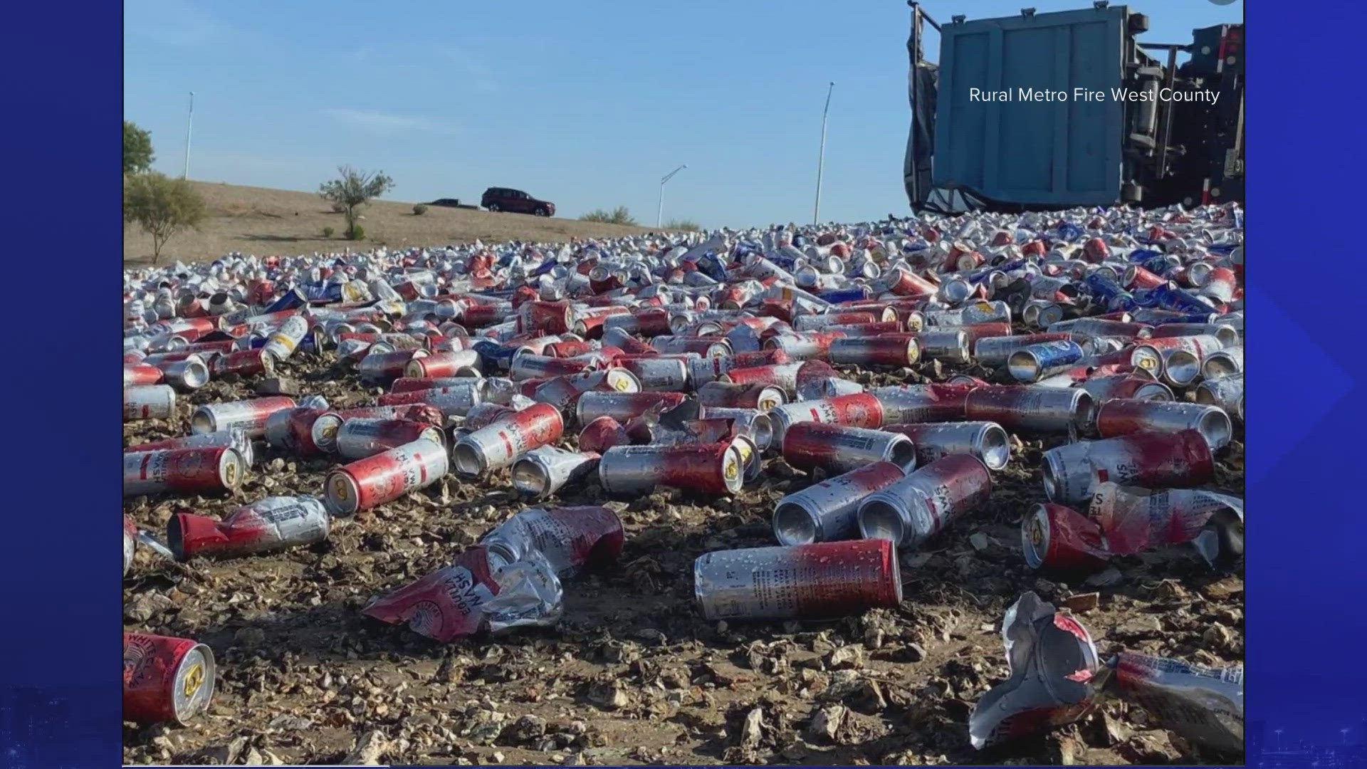 The cans covered the side of the highway after a truck flipped.