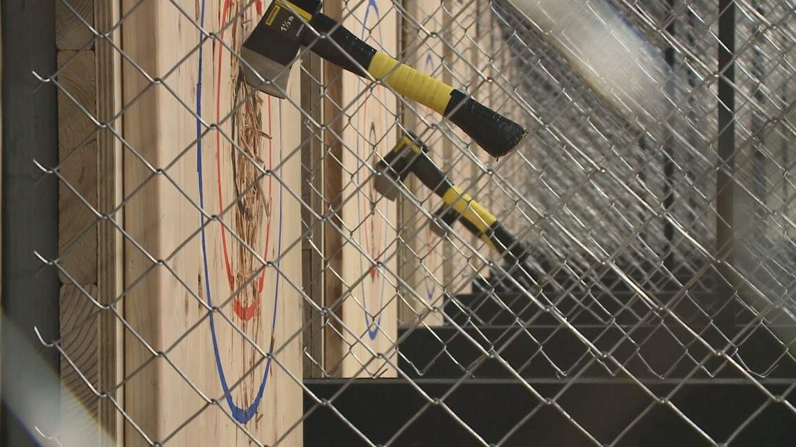 Rachel Cole tests her axethrowing skills Lumberjaxes in Tempe