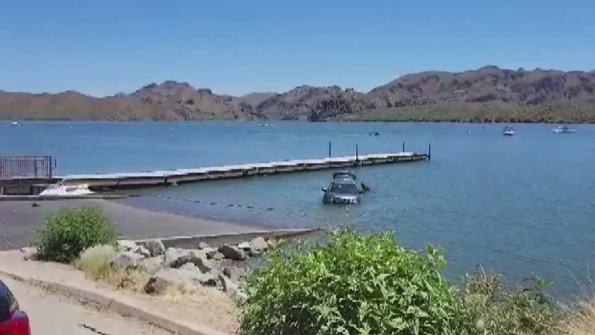 The Maricopa County Sheriff's Office says the drive accidently drove back a little too far while dropping off jet skis.