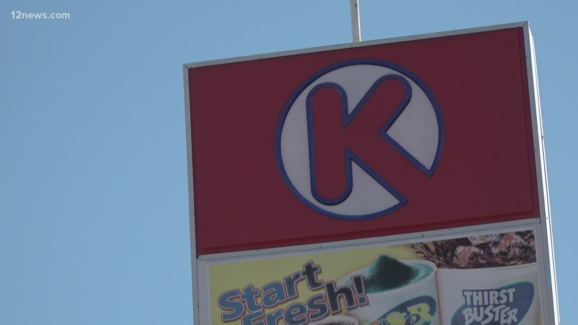 A man died in Phoenix police custody Sunday morning after police say he trapped people inside a Circle K.