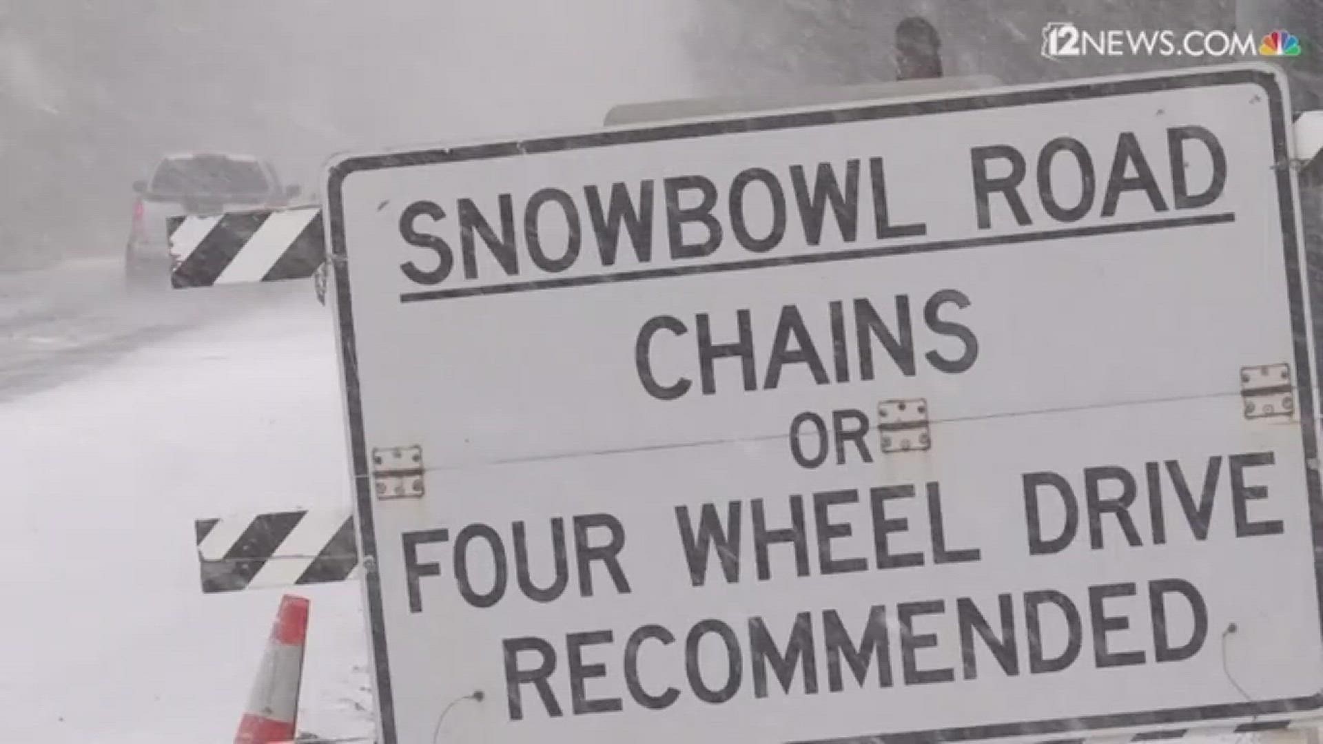 Two Northern Arizona University students were on their way to hit the slopes Friday when the winter storm turned Snowbowl Road into an icy trap.