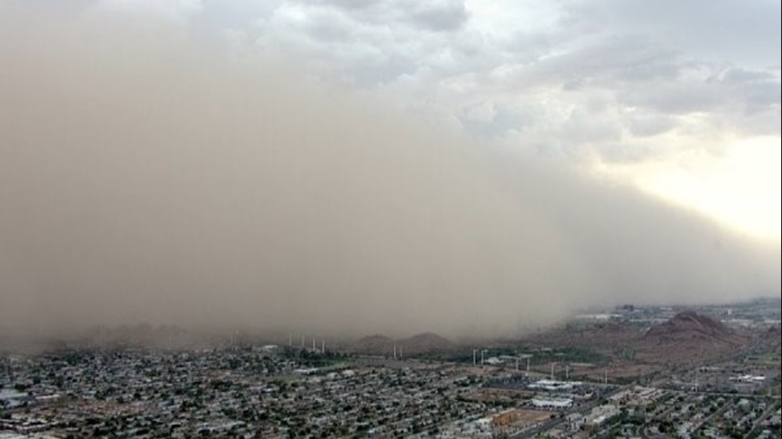 Monsoon storms bring massive wall of dust, down power lines in the ...