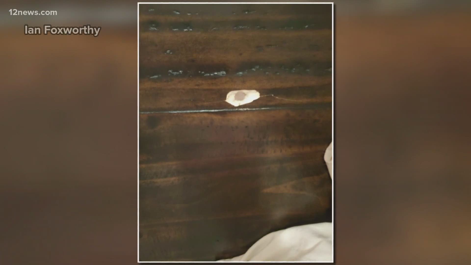 Ian Foxworthy said he and his partner and their dog were all in their bed at the time when the bullet hit the headboard and ricocheted around the room.