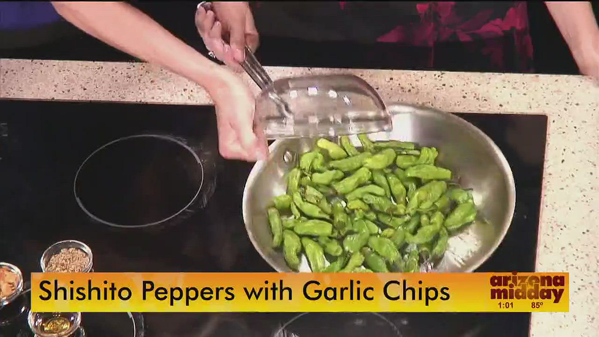 Michelle Dudash, creator of Clean Eating Cooking School,  makes shishito peppers and garlic chips.