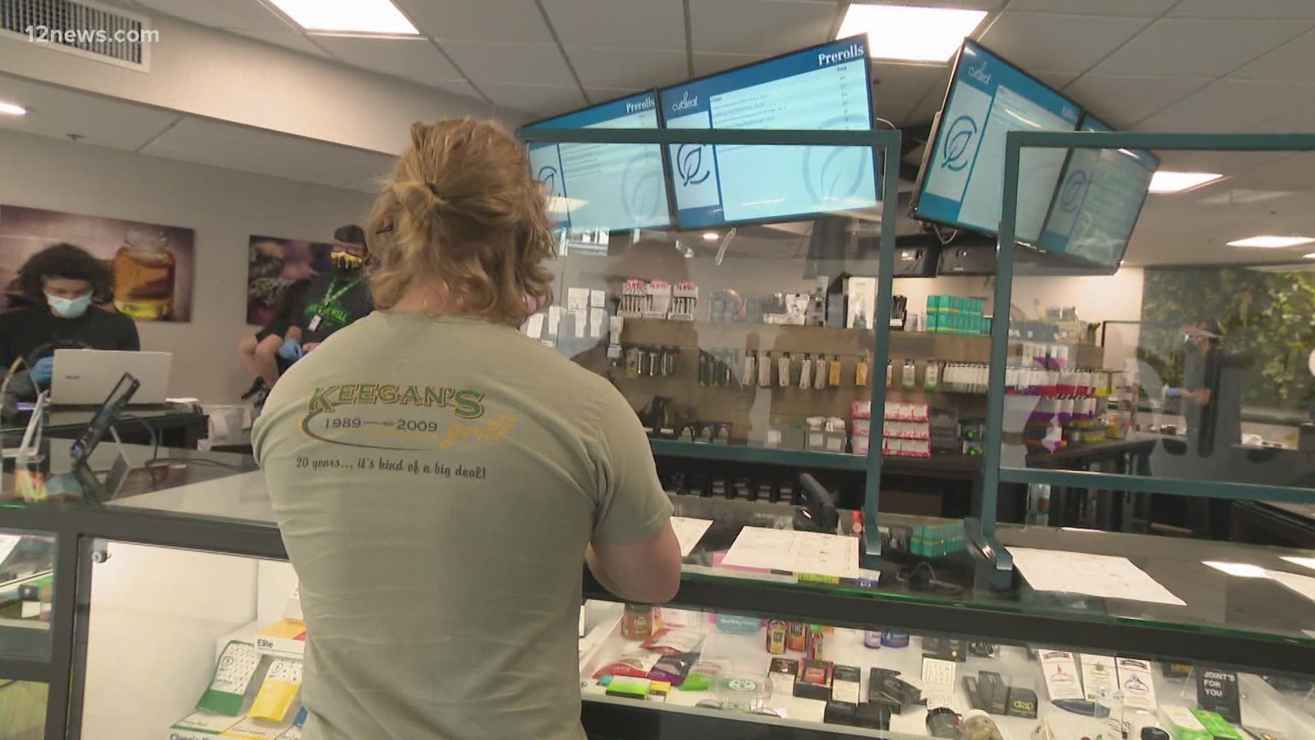 Crowds at dispensaries in downtown Phoenix gathered as they opened their doors for the first time to sell recreational marijuana.