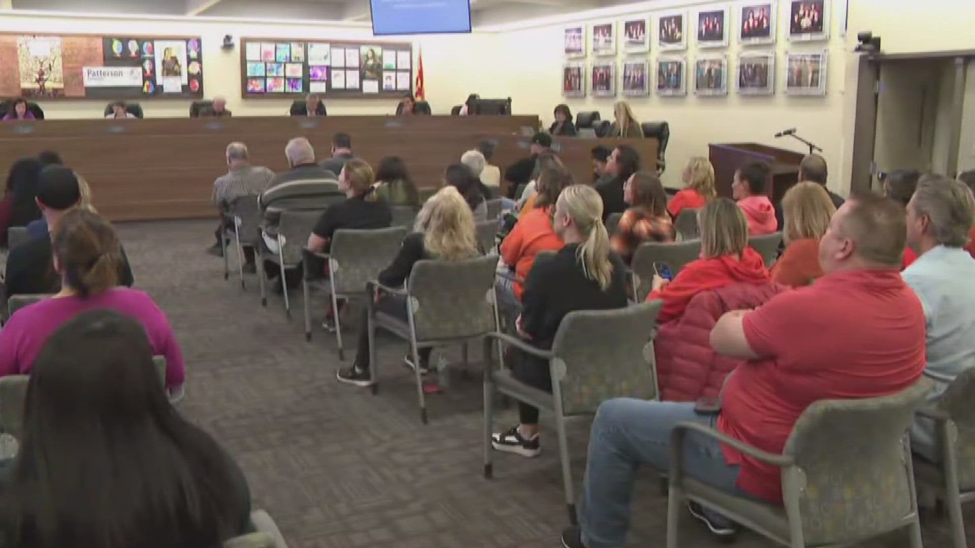 An East Valley school board meeting was fiery and tense Wednesday night with the community demanding answers after a Gilbert principal was placed on leave.