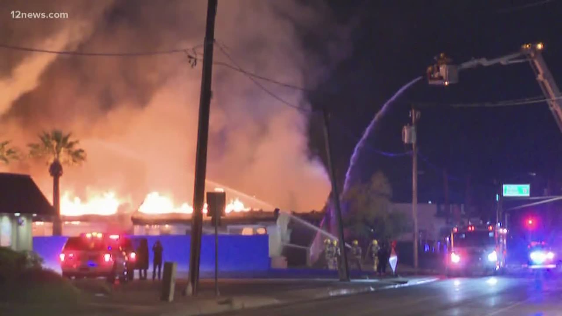 The fire was burning in a structure near 12th Street and Indian School Road, Phoenix FD said.