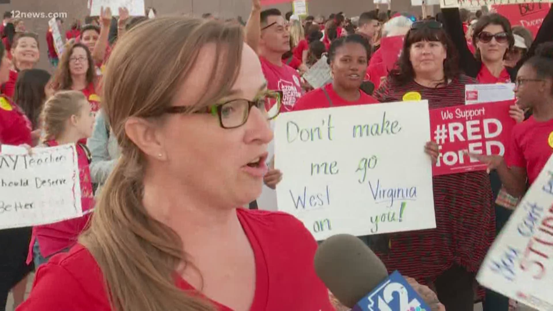 Wearing red for ed, Arizona educators are calling for higher pay. 