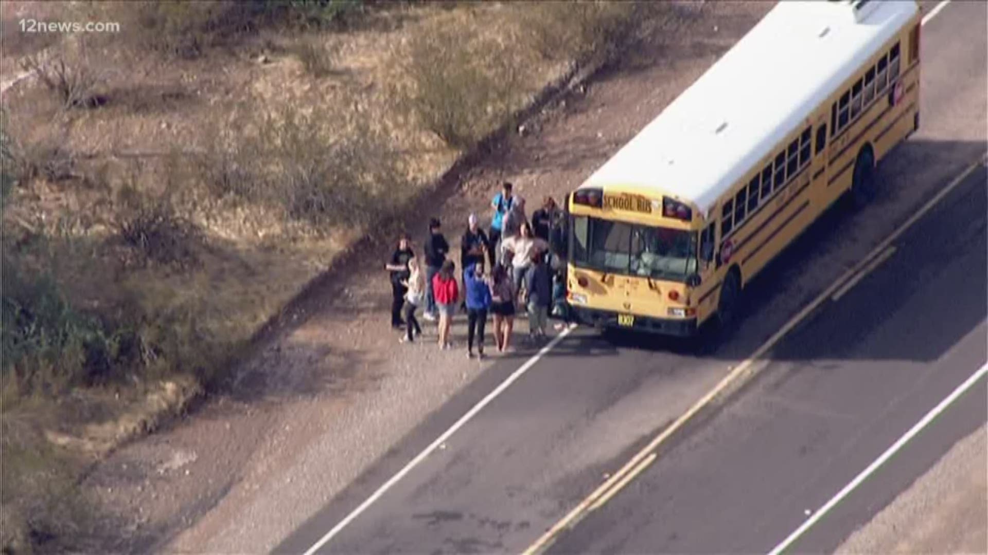 19 students on a school bus in Wittman were stranded between two flooded washes. Firefighter eventually rescued the students and cleared the road for other cars.