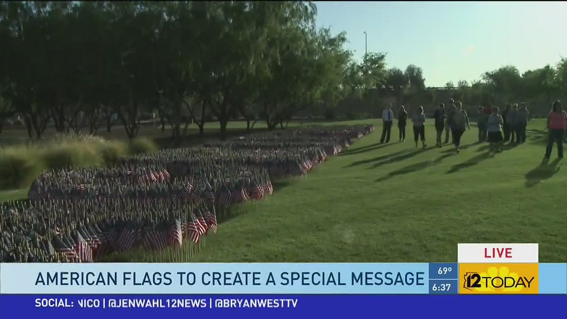 Volunteers placed about 10,000 flags, spelling out the message "salute to sacrifice" at University of Phoenix Tuesday morning.