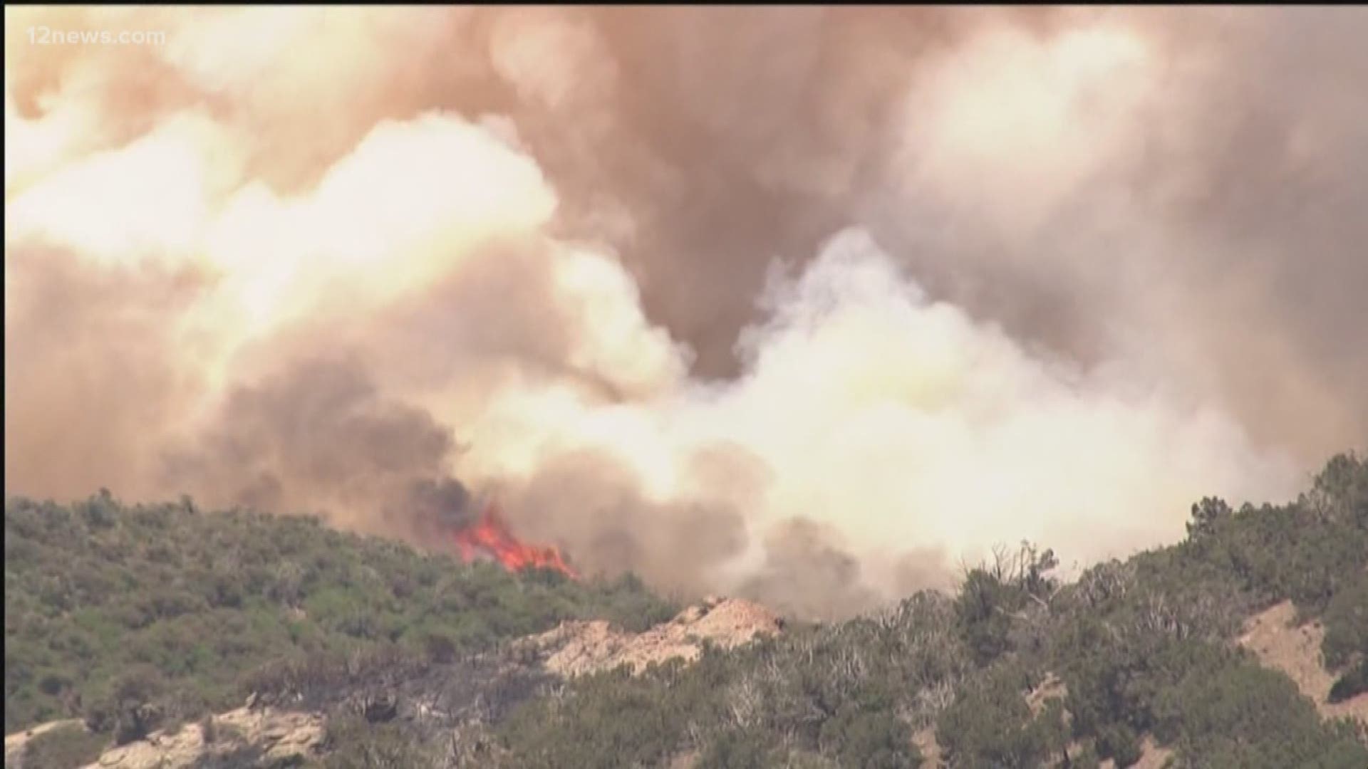 Gila County deputies were telling residents near the Woodbury Fire in the Superstition Mountains to evacuate Thursday afternoon as the fire got closer to homes. Two residents decided to stay in their home.