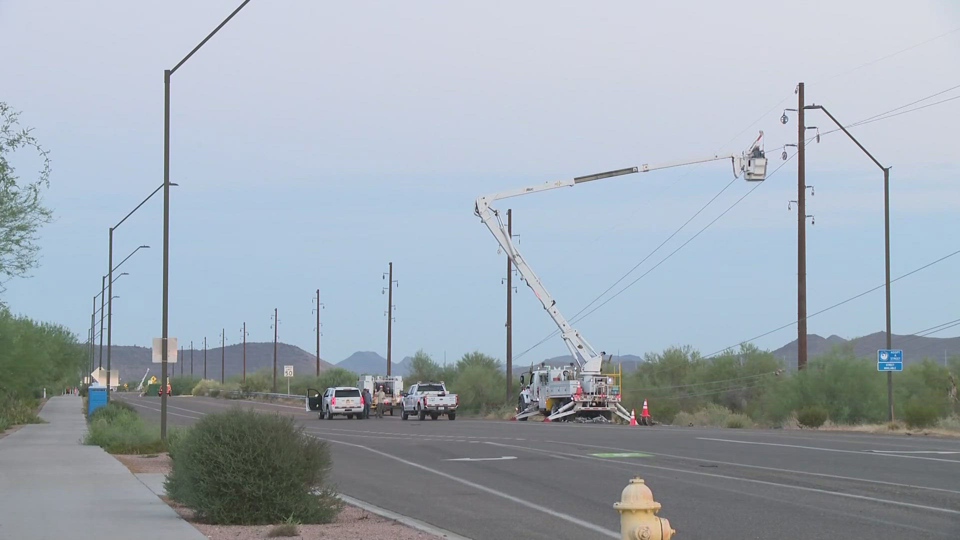 APS crews continue repairs on several power poles in north Phoenix after weekend storms moved through the Valley.