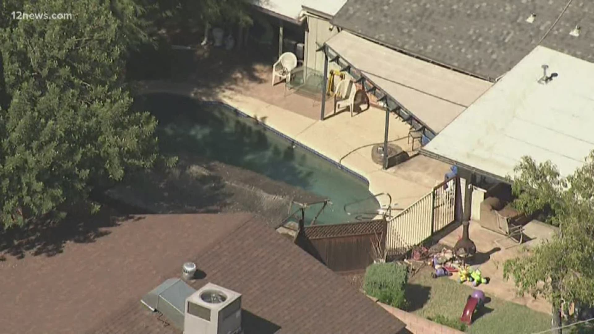 The child is fighting to survive after being pulled from a pool and taken to a hospital in critical condition.