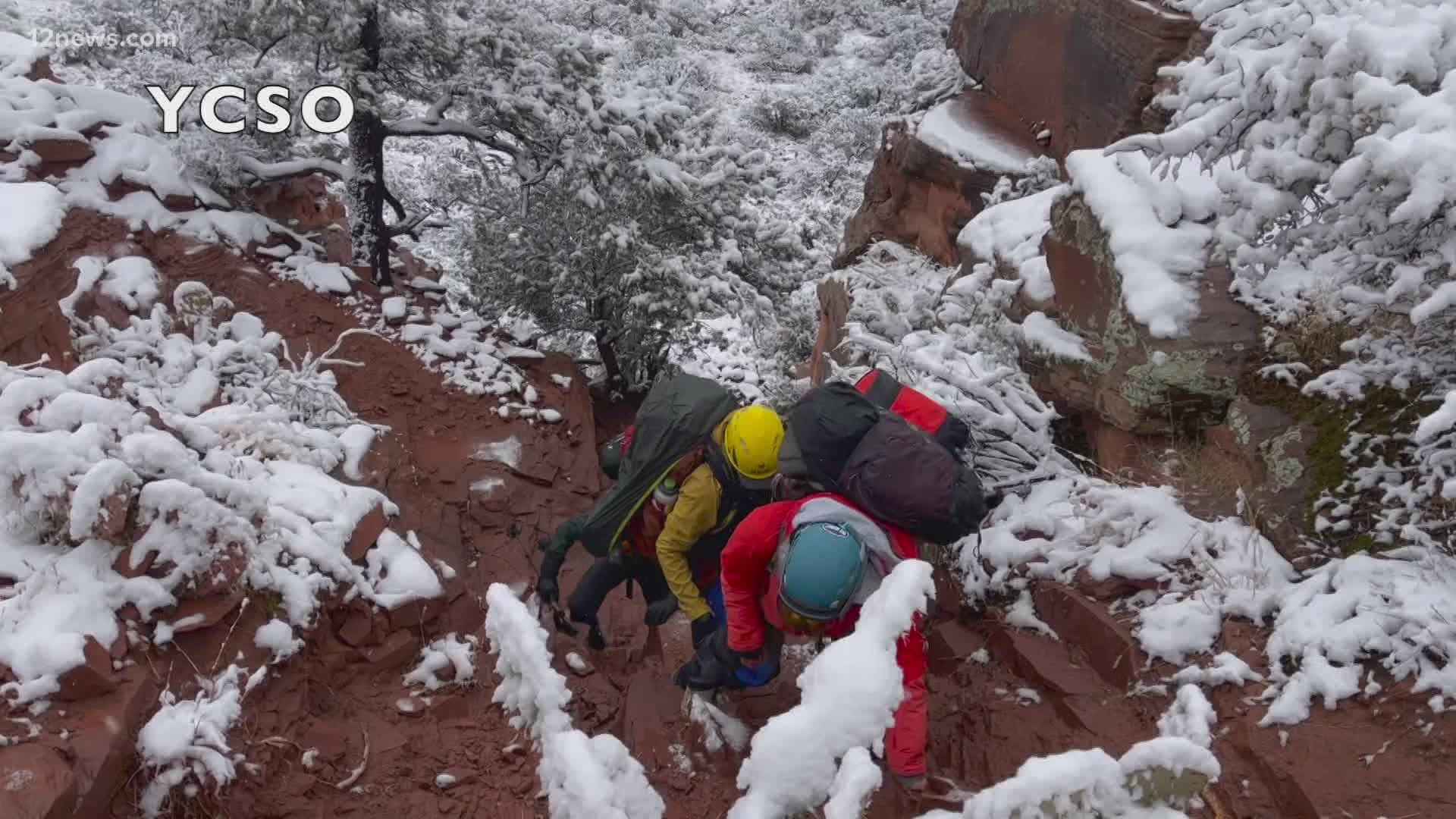 Dramatic video shows a rescue near Sedona during the worst of this week's storms. It took experienced rescuers two days to get the hikers off the mountain.