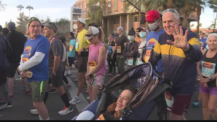 Phoenix marathoner crosses finish line with more than 60 people with disabilities
