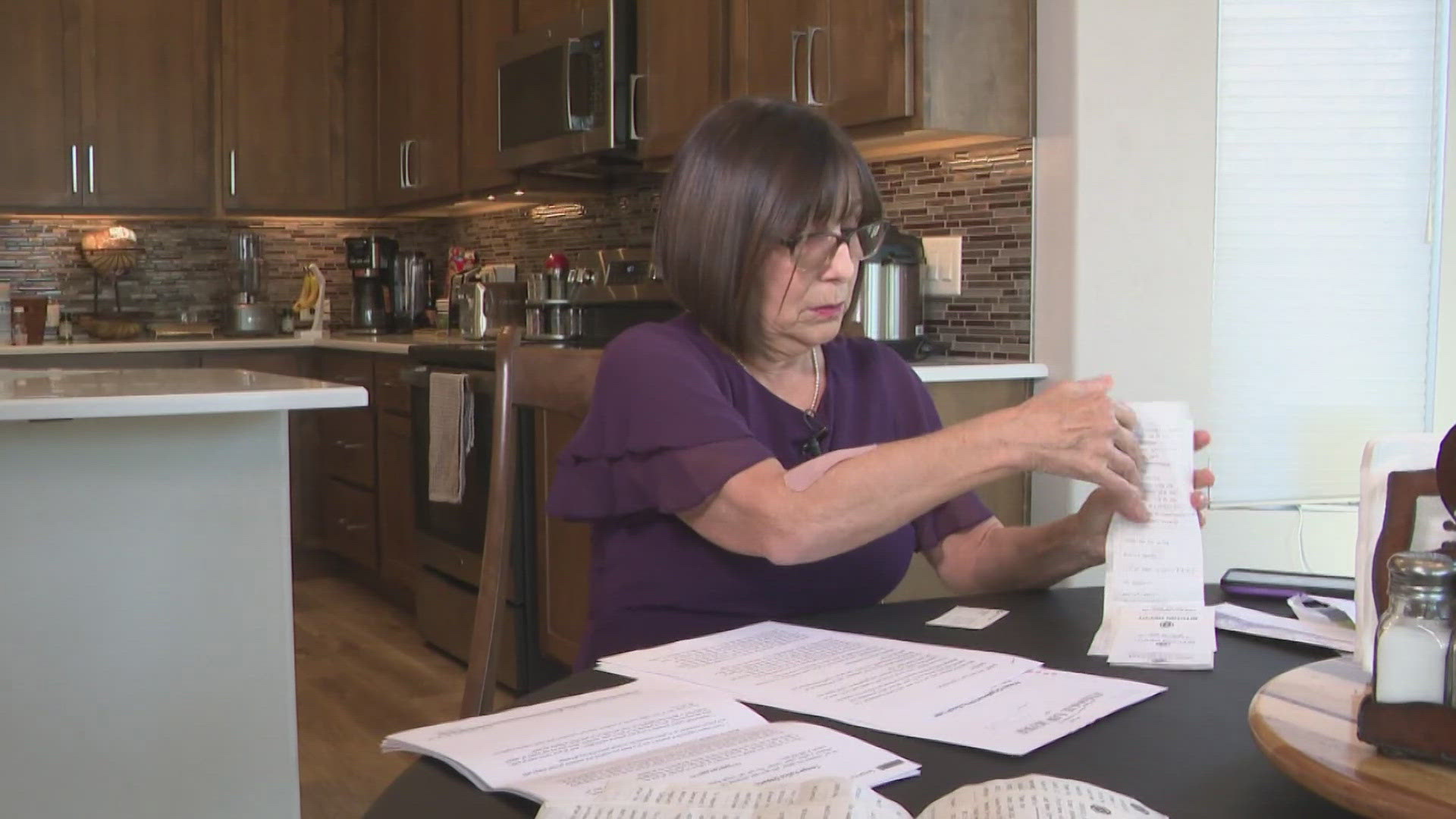 A Valley woman who was scammed by someone claiming to be a sheriff's deputy wants to send a warning to others. 