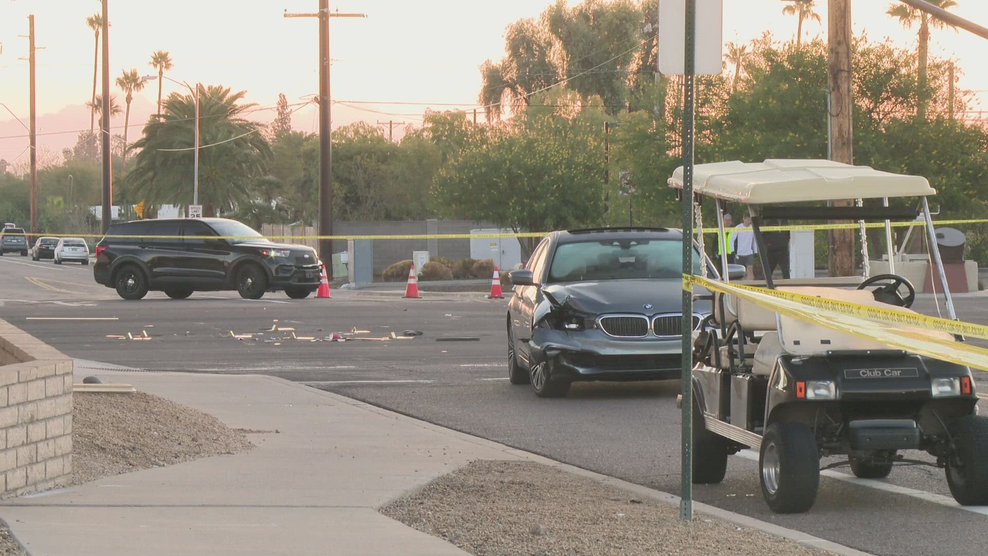 A portion of Scottsdale Road was shut down Saturday morning after a collision between a golf cart and a car