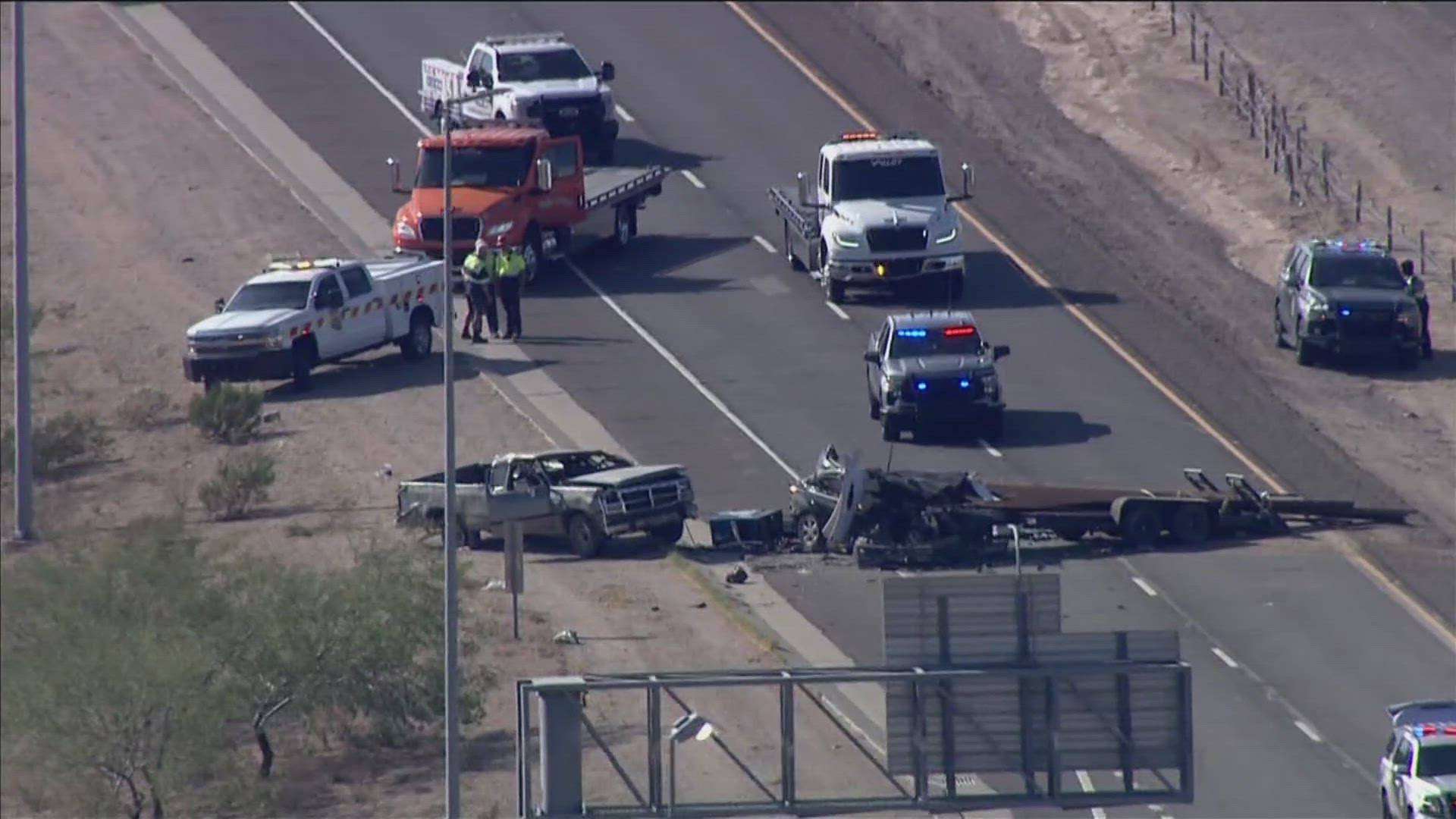 A pickup truck hauling a trailer stacked with pipes jackknifed near milepost 195 on the US 60.