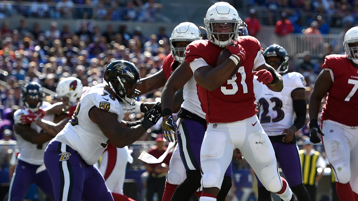 Lamar Jackson helps Ravens run past Cardinals 23-17