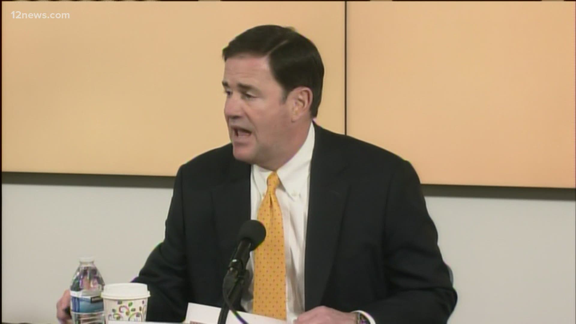Gov. Ducey was solemn at a press conference about COVID-19 surges in Arizona on Thursday. He said the state is on pause, but didn't issue orders pausing anything.
