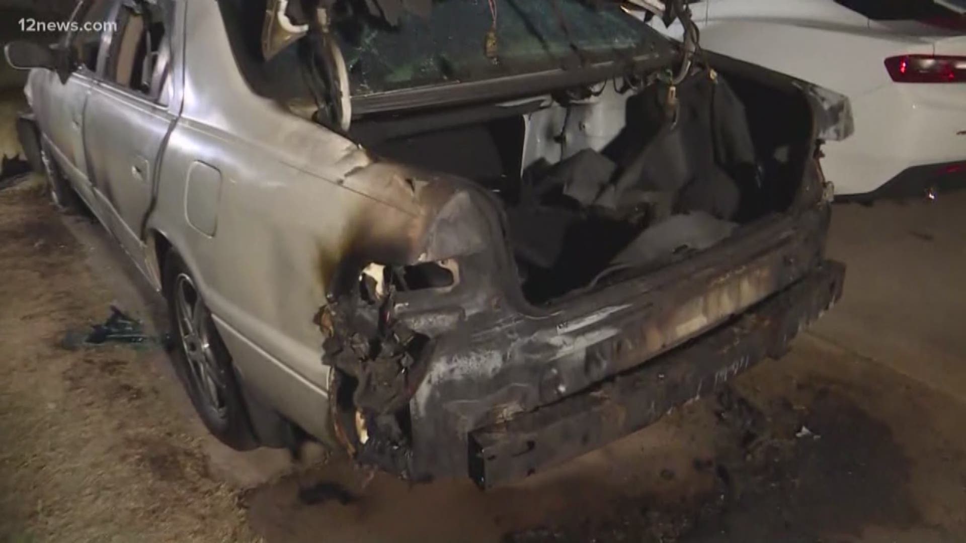The hunt is on for possible arsonists after cameras caught someone setting a teenager's car on fire just feet from the family's doorstep. More surveillance video shows two people setting a tree on fire in the same neighborhood.