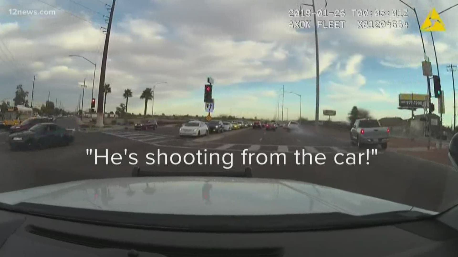 Video shows police in hot pursuit of two suspects who shot at officers from the car and then tried to run before they were taken into custody.