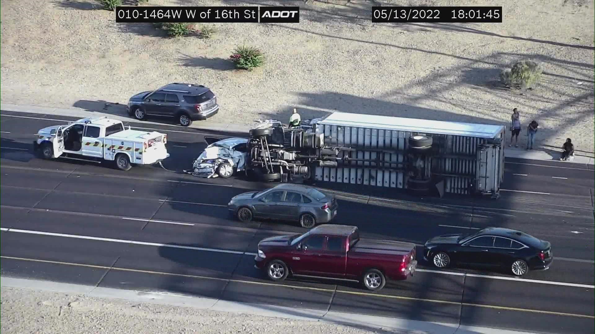 Traffic is massively delayed in Downtown Phoenix due to an accident involving a semi-truck on I-10 near 16th Street. Four different vehicles are involved.