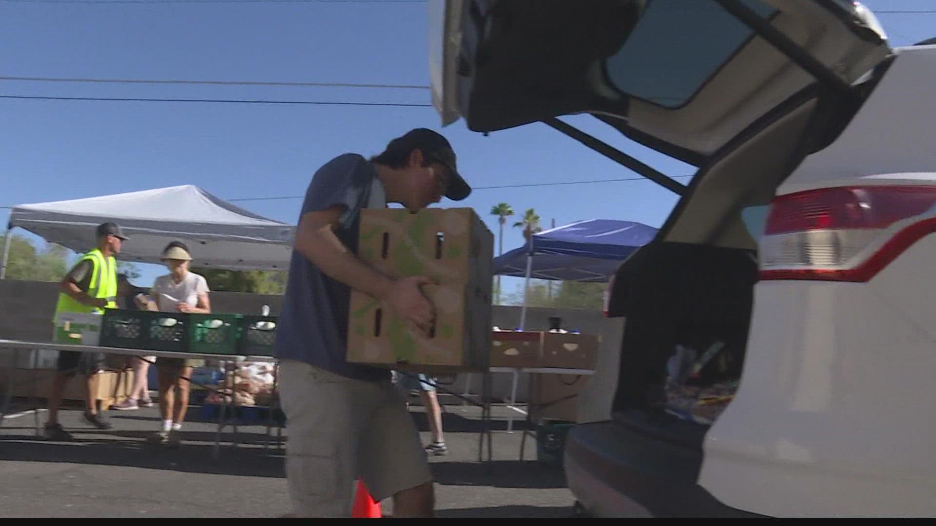 An Apache Junction organization loads 150 food boxes into cars once a month. They meet the temporary and long-term needs of people in the community.