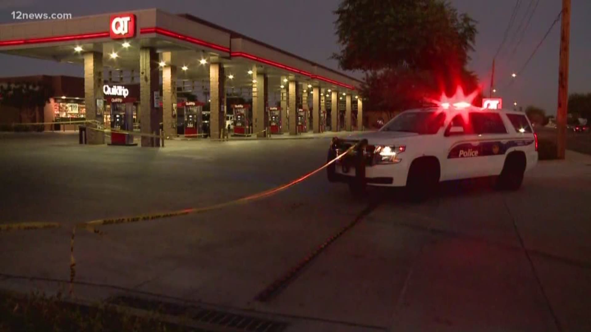 A gun went off inside the car, hitting the boy who was outside the car helping his father pump gas.