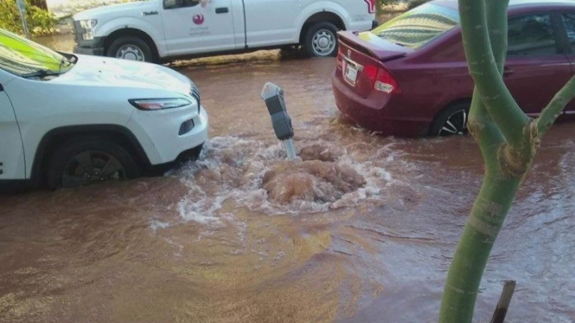 Water flooding onto downtwon Phoenix roadway