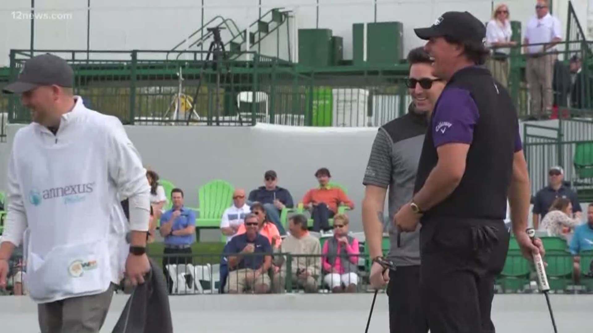 Phil Mickelson may be a rock star on the green, but in today's Pro-am, he played with an actual rock star. Well, country star. Jack Owen paired up with Phil to hit the links at the Waste Management Phoenix Open.