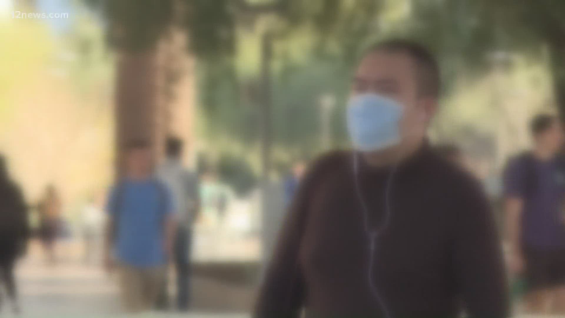 All students, faculty members and visitors to ASU's campuses will be required to wear masks while on campus. ASU's president says the change is necessary.