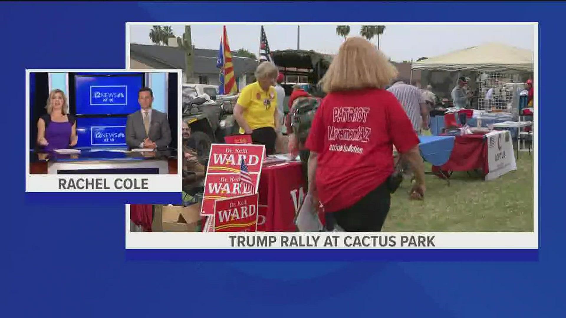 Hundreds of Trump supporters gathered at Cactus Park in northwest Phoenix Saturday afternoon touting the rally as one year celebration of the president fighting for Americans.