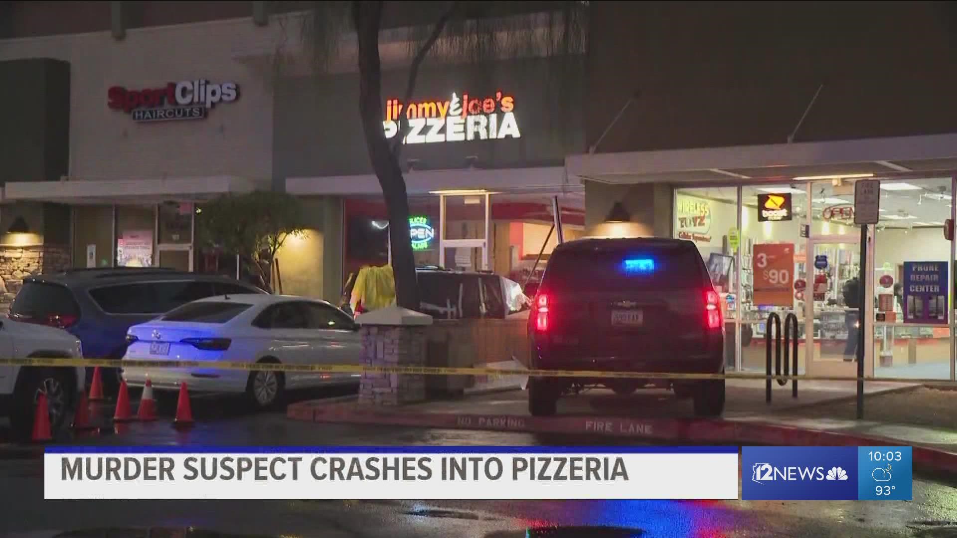A murder suspect trying to get away from police but ends up driving straight into a pizza place with employees and a customer inside.