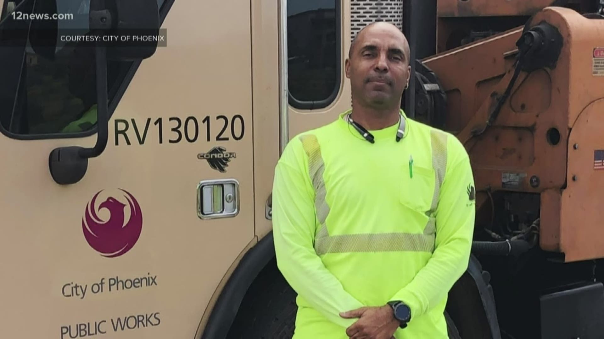 A Phoenix recycling truck driver is being hailed a hero after racing into a house to save the people inside. He says he did what anyone would have done.