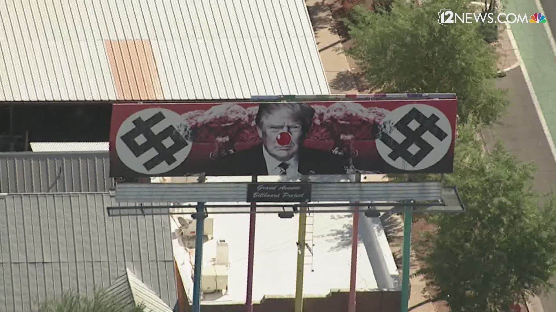 It appears that a red clown nose was recently added to a billboard depicting President Donald Trump. The billboard is located at Grand and 11th avenues in Phoenix.