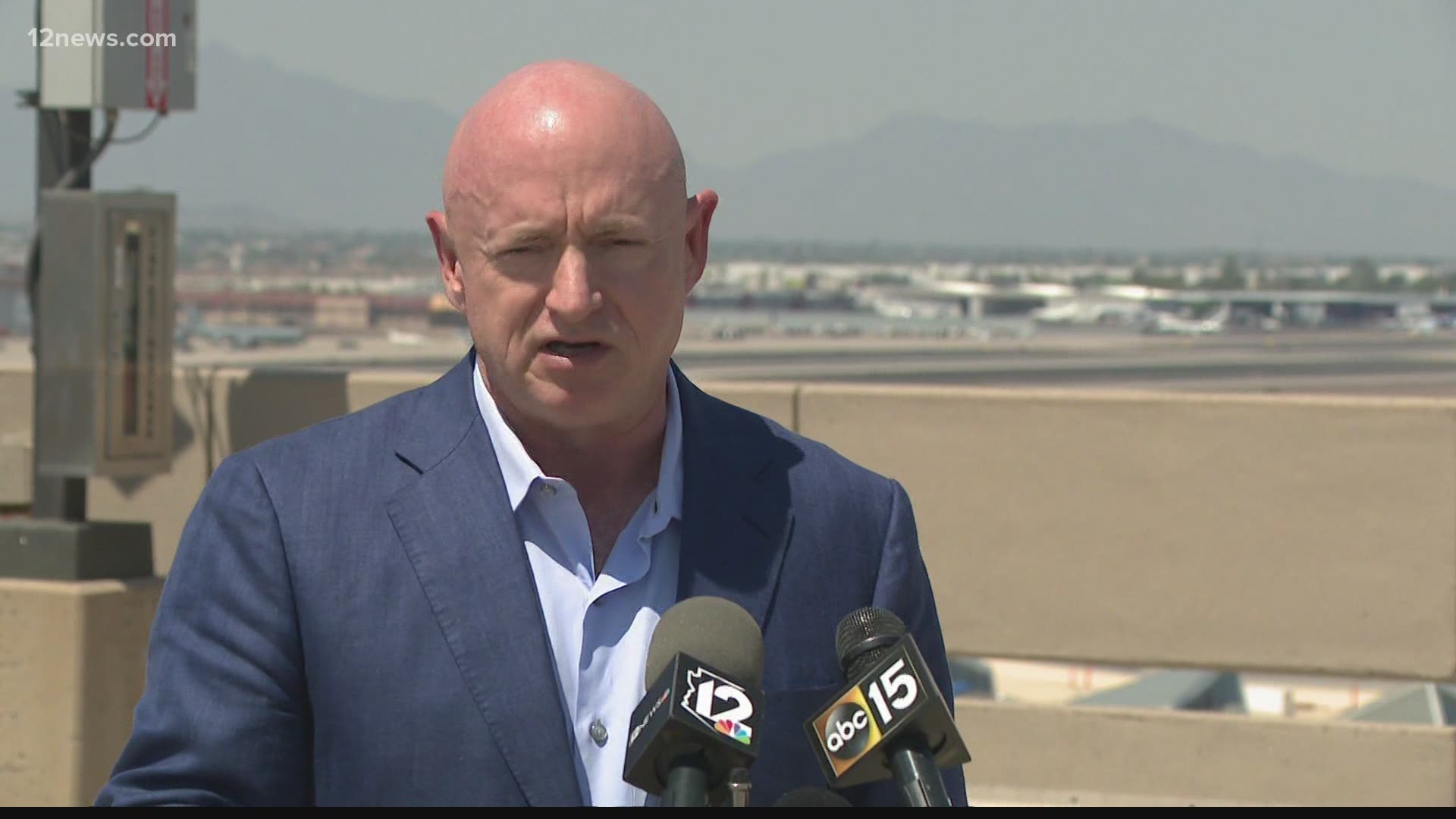 U.S. Senator Mark Kelly used a tour of Sky Harbor Airport to tout the bipartisan infrastructure plan working its way through the Senate on Thursday.