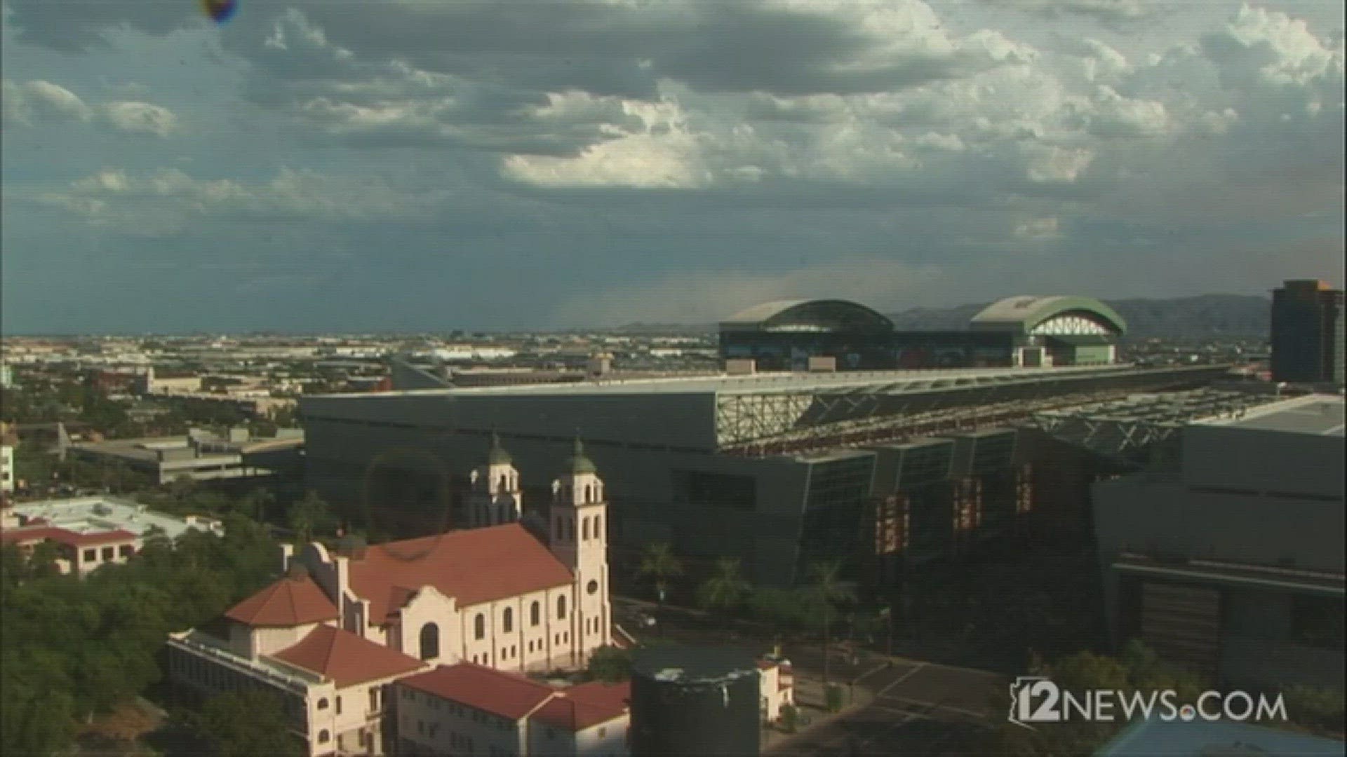 Amazing time lapse shows a massive wall of dust consuming downtown Phoenix. Chase Field is pictured. Elapsed time is about 2 hours.