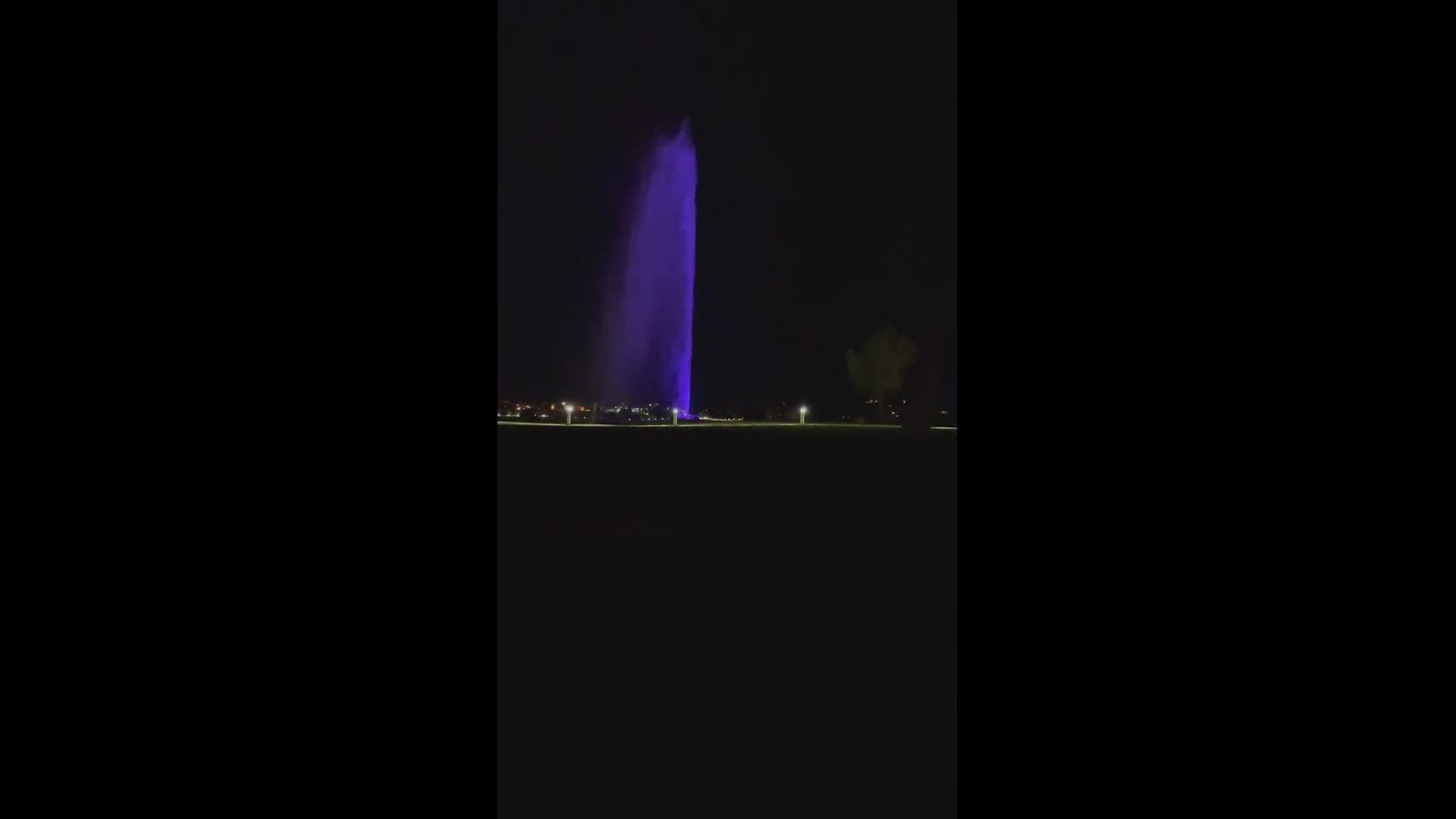 The fountain in Fountain Hills glows purple and orange.
Credit: Celia Warren