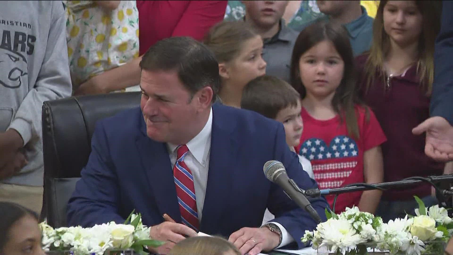 Ducey touted the signature bill he signed in July that gives all Arizona parents the ability to take state money that would go to their local public school and inste