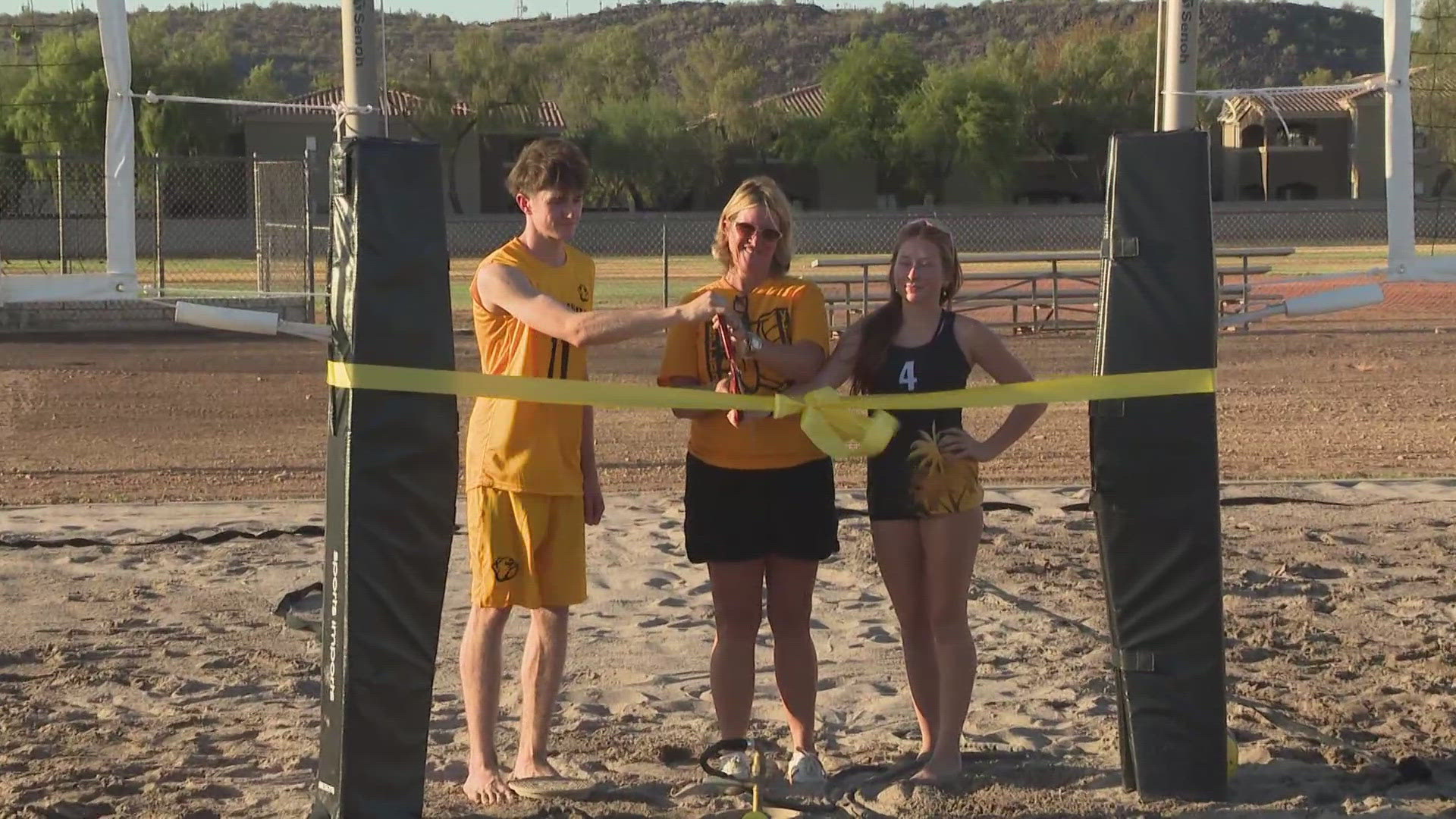 Students from Barry Goldwater High School participated in the grand opening event for the school's new beach volleyball court.