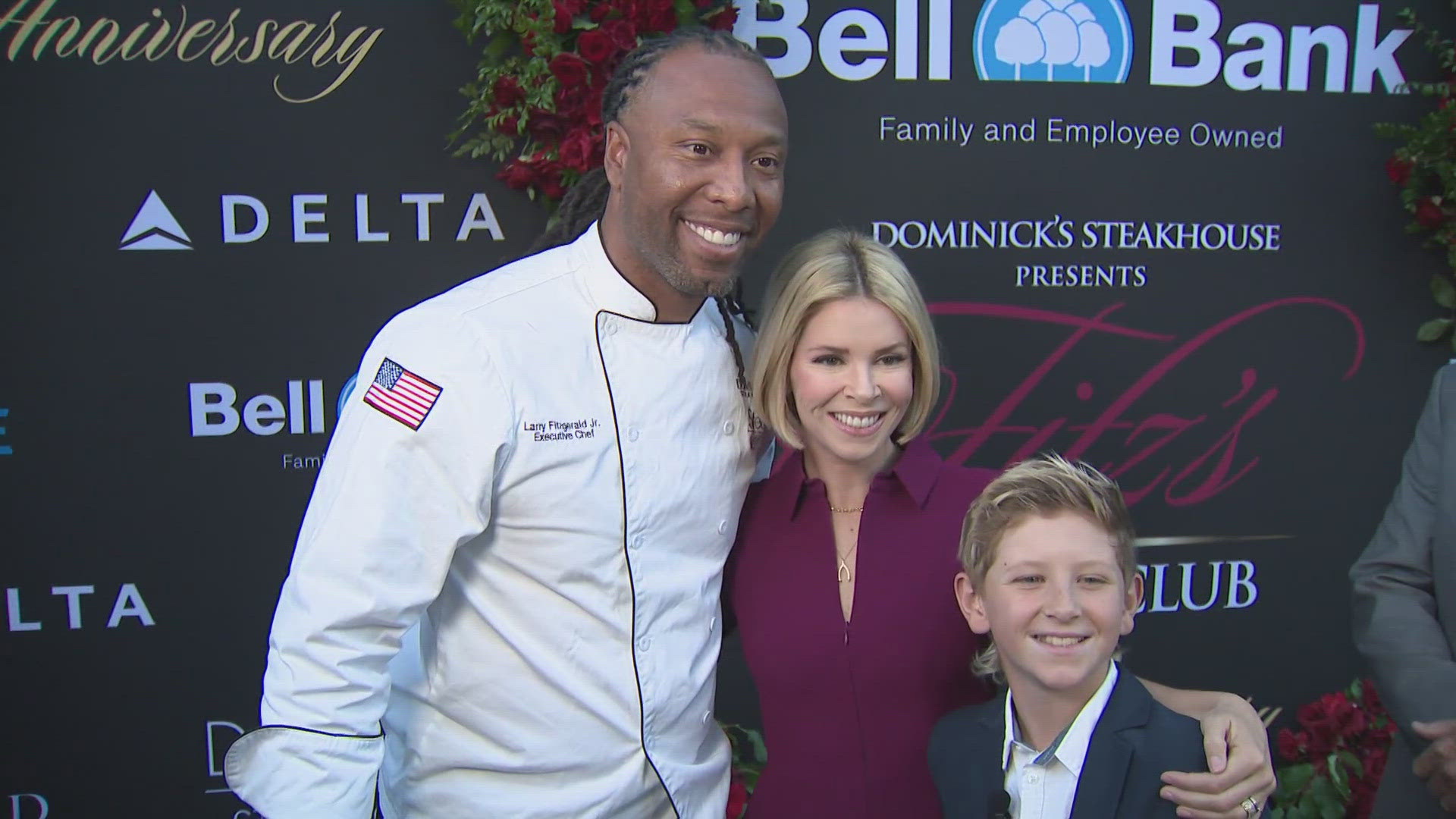 Cardinals great Larry Fitzgerald took a moment at his Fitz's Supper Club fundraiser to speak with Emma Jade's son and talk about sports and giving back.