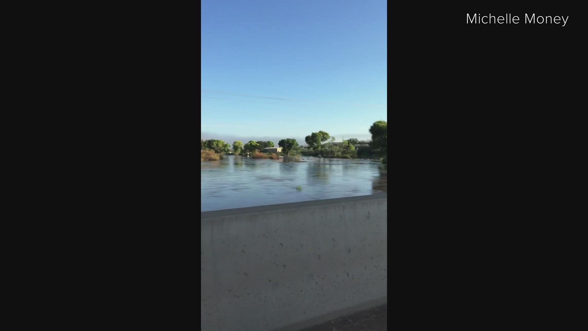 Facebook user Michelle Money captured video of the flood nearly reaching the roadway.