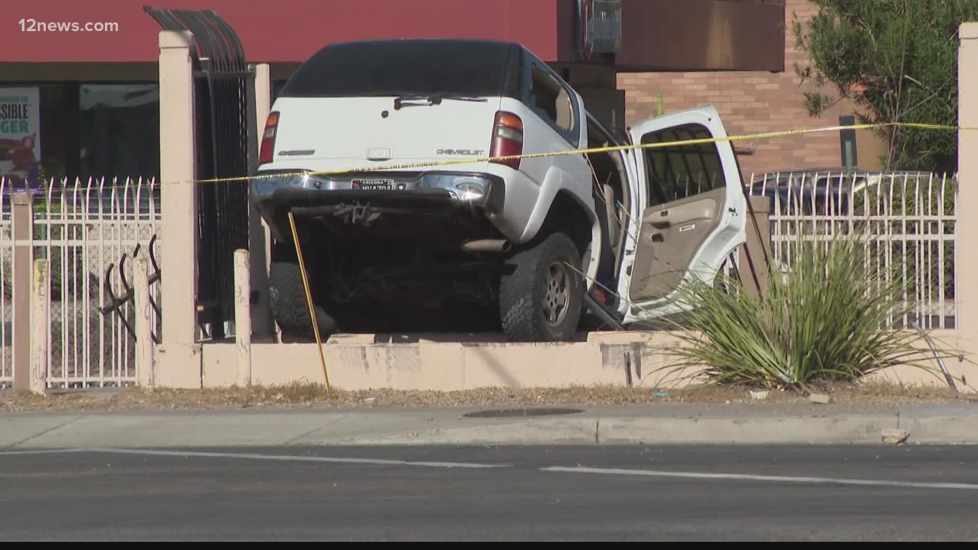 Surveillance footage has helped Phoenix police arrest a 27-year-old woman accused of shooting a motorist last month during a road rage incident.