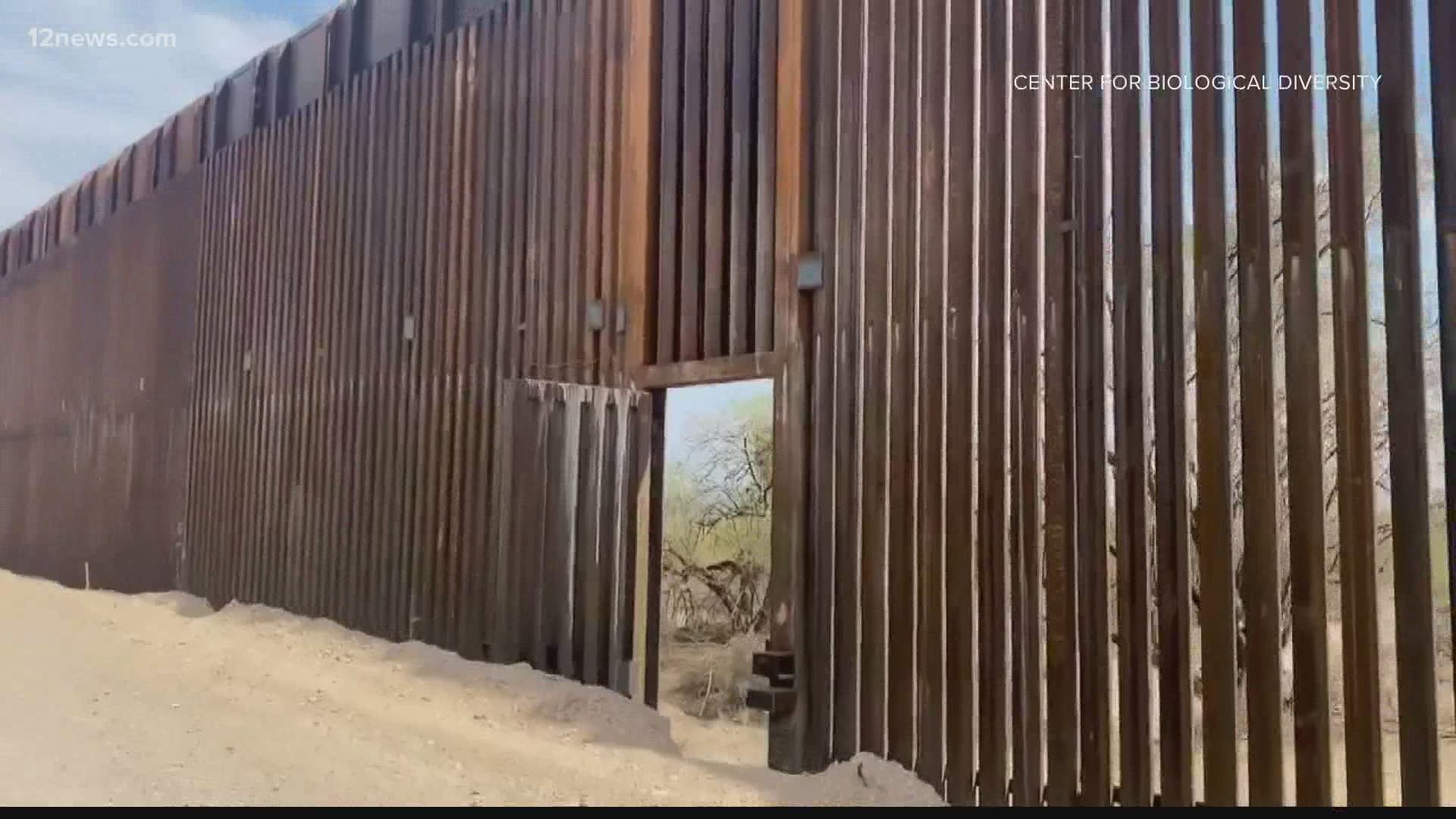 Open gates along the border wall are common during monsoon season. Anti-wall activists say the open gates demonstrate that the wall is just a political stunt.