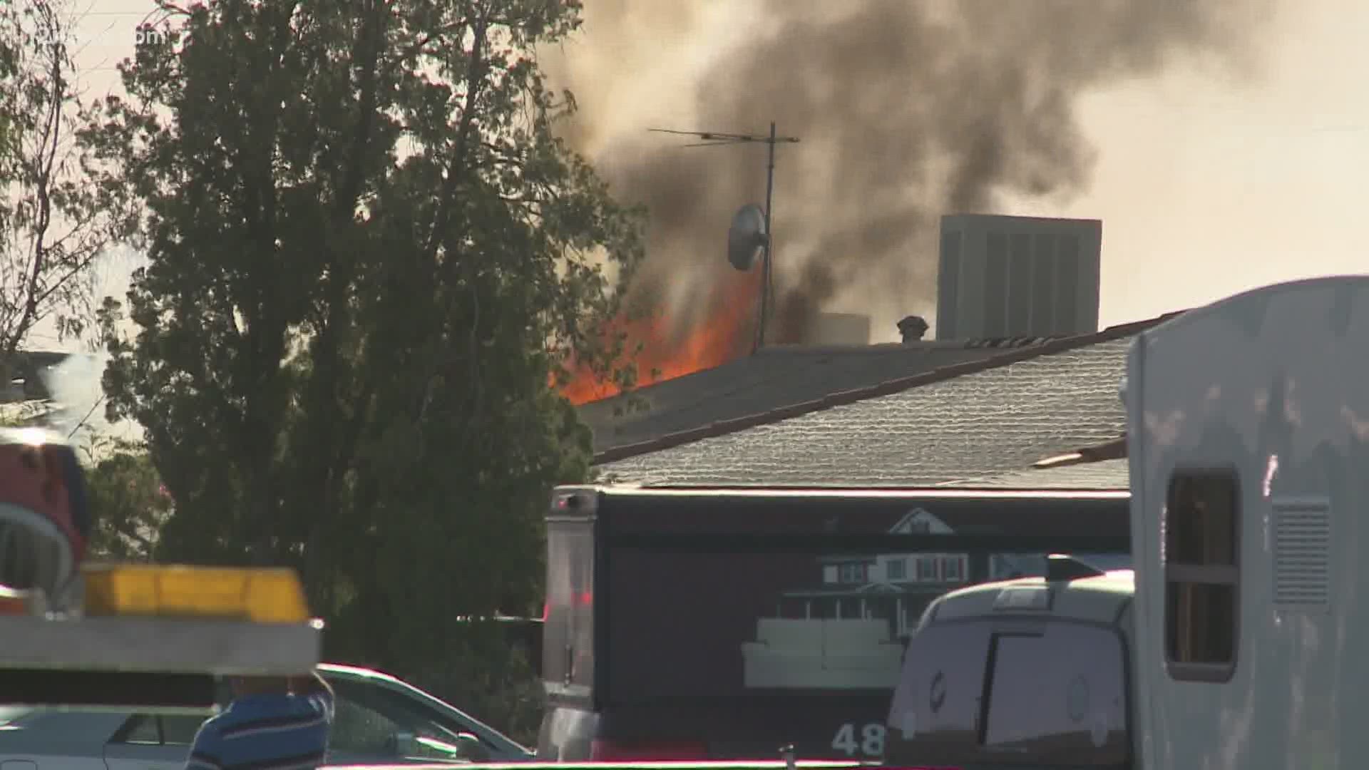 Two families are displaced after a double house fire in east Phoenix this afternoon.