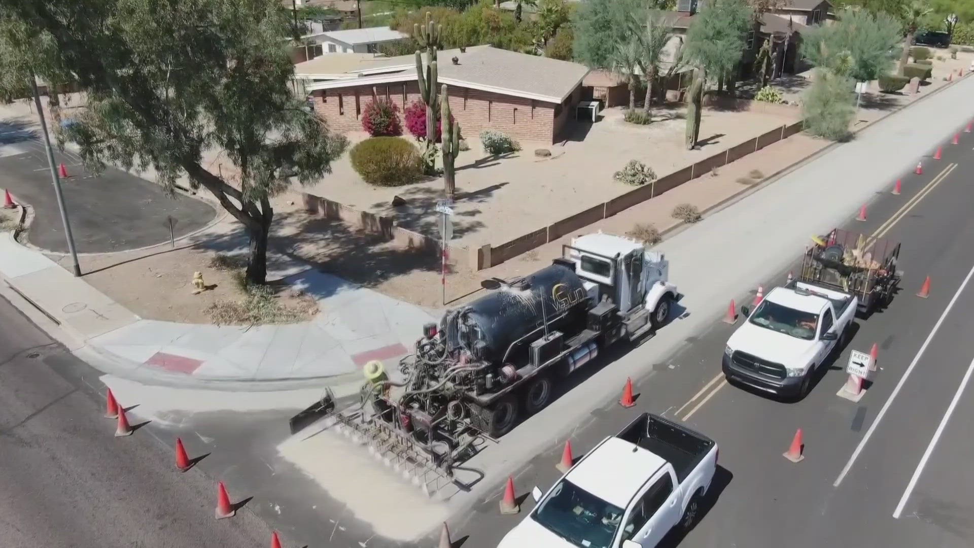 The city began testing cool pavements in 2020. Representatives say the roads with the treatment are 12-15 degrees cooler than regular asphalt.