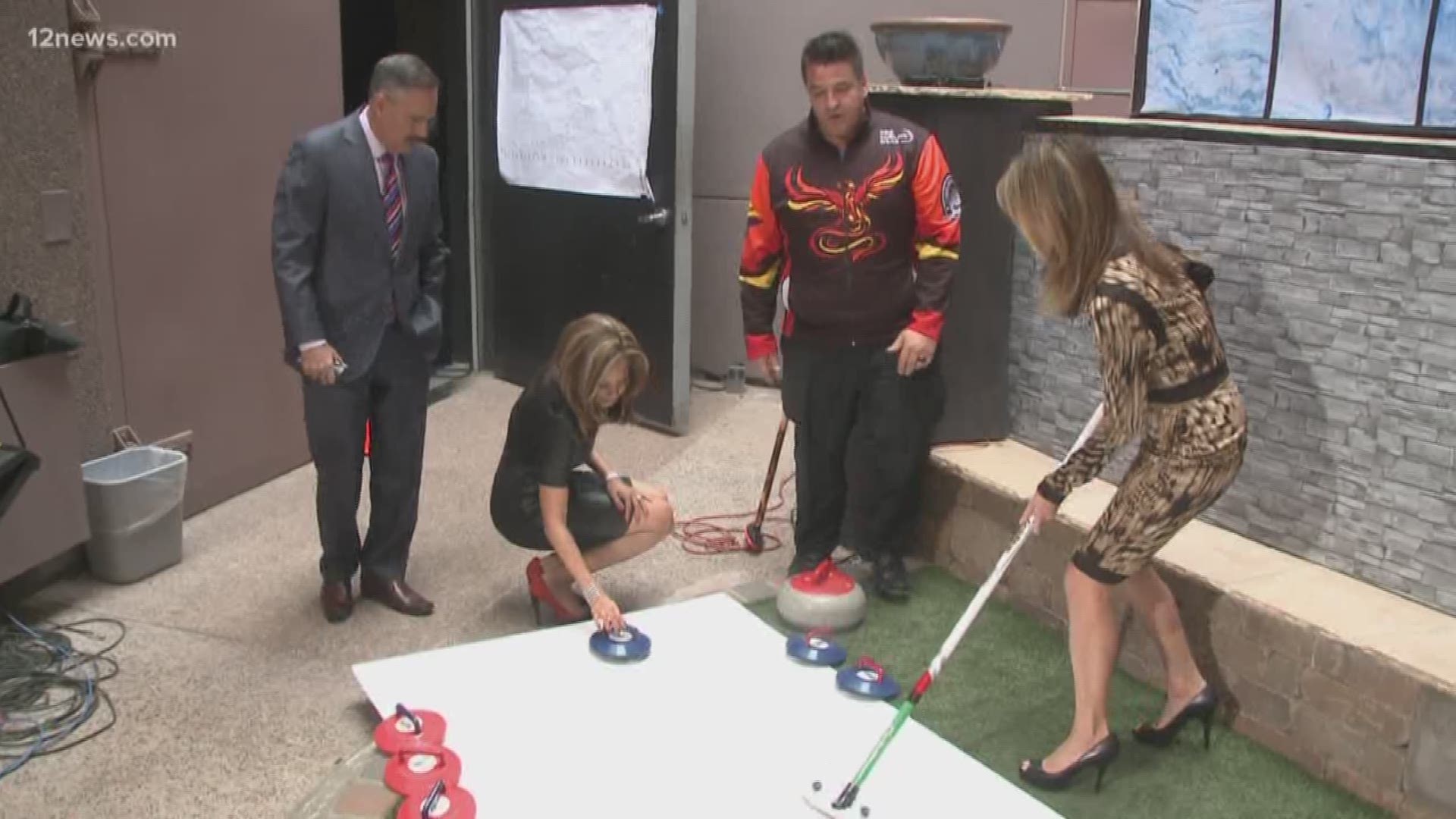 Darryl Horsman from the Coyotes Curling Club stopped by the 12 News studio to teach Mark Curtis, Caribe Devine and Tram Mai how to curl.