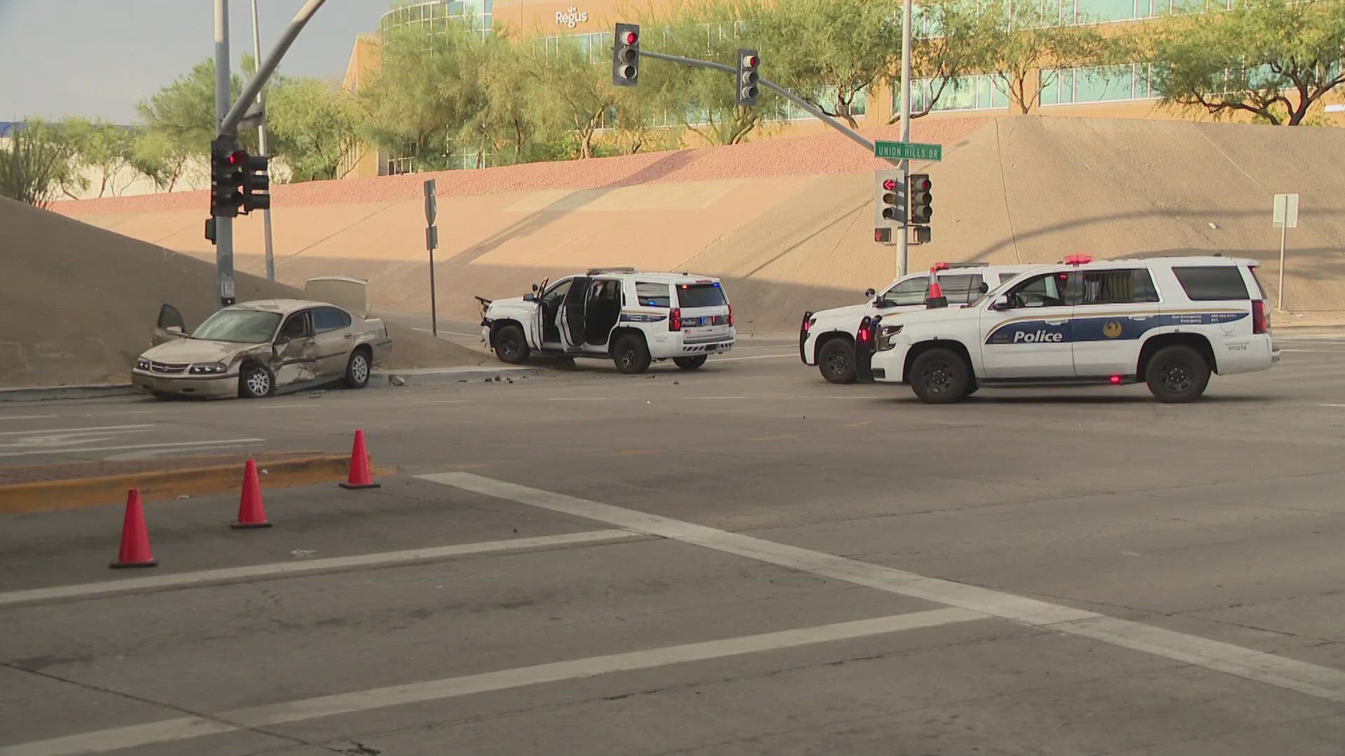 2 Phoenix police officers were in a marked SUV when they were injured in a crash. Watch the video above for more information.